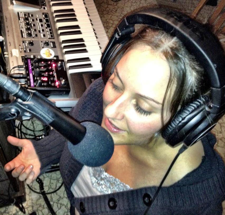 Jiggabot at studio microphone with Roland keyboard